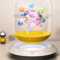 Rotating Rattle Ball™ – Sensory Rattle - Baby Toy